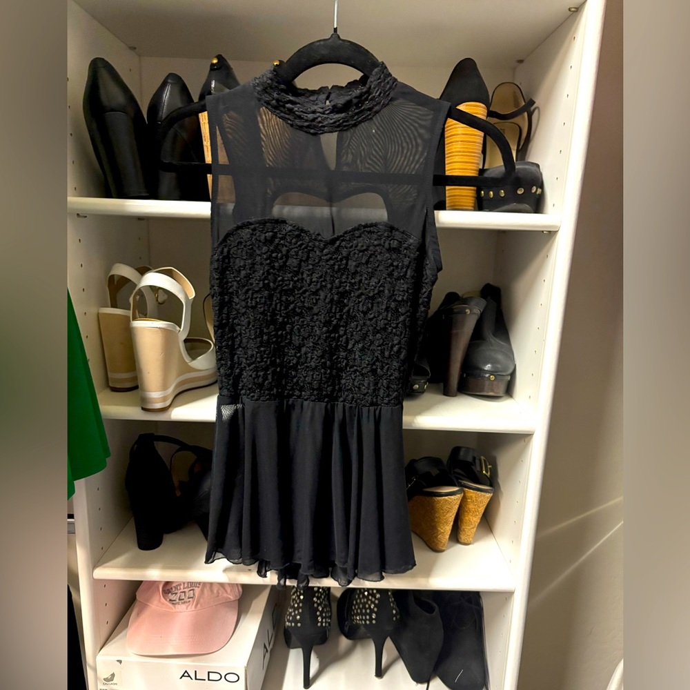 Sleeveless Black Lace peplum top